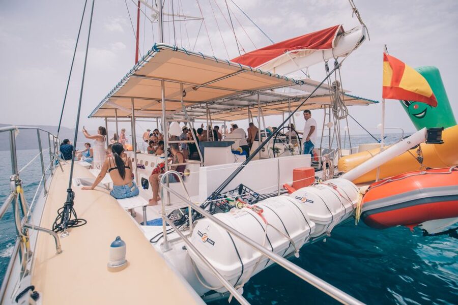 From Lanzarote: Sailing Day Trip Around La Graciosa - Boarding the catamaran with snacks and a welcome drink