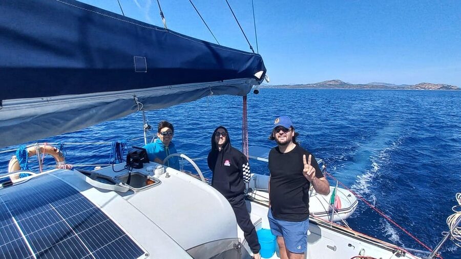 From Olbia: Tavolara or Cala Moresca Catamaran Tour - A small catamaran from Olbia
