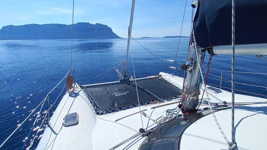 From Olbia: Tavolara or Cala Moresca Catamaran Tour - Swimming, SUP, and time on board