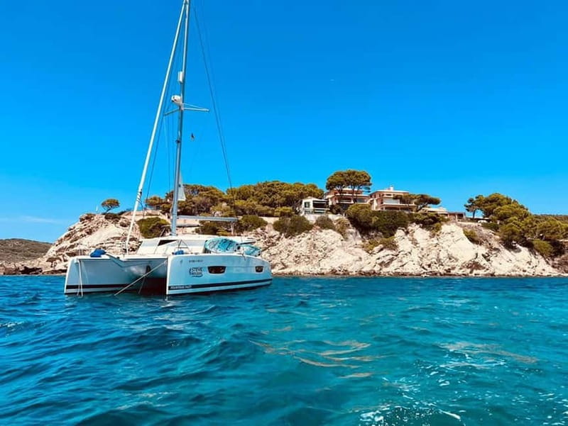 From Palma: Luxury Catamaran Group Tour with Tapas & Drinks - The four-hour route and swimming stop
