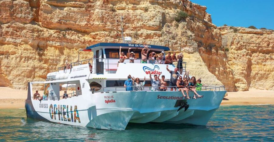 From Portimão: Catamaran Cruise to Benagil Caves with BBQ - From Portimão to Ferragudo by catamaran