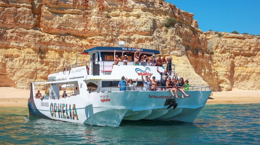 From Portimão: Catamaran Cruise to Benagil Caves with BBQ - Benagil Cave by small boat