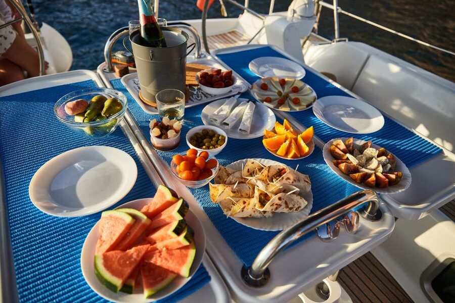 From Puerto de Mogán: Sailboat Trip with Food and Drinks - Languages, cancellations, and practical booking details