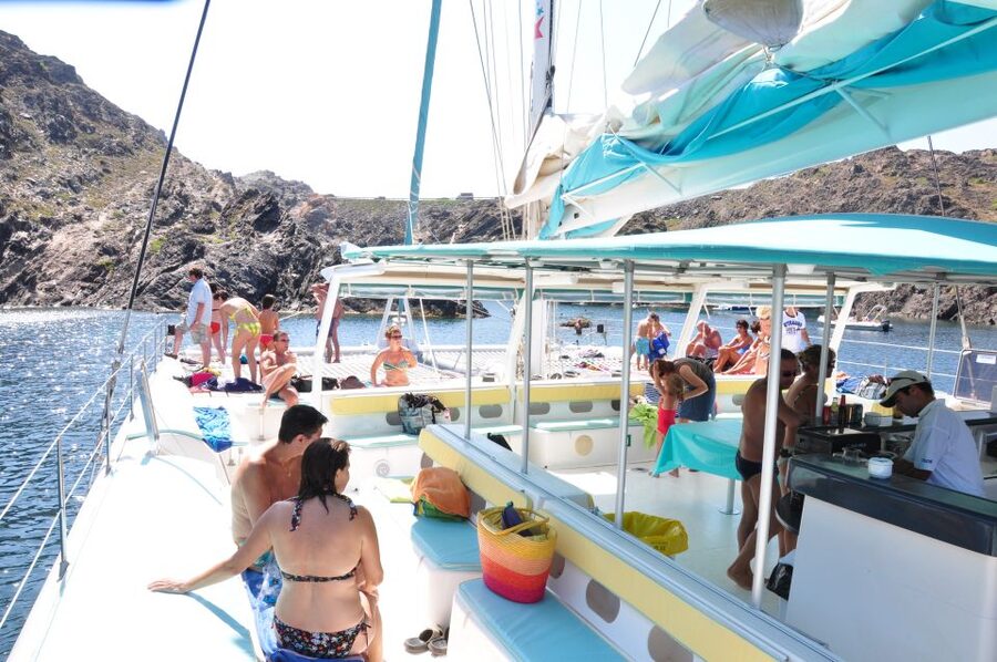 From Roses: Catamaran Cruise Cap Norfeu - Cadaqués - Leaving Roses for the Costa Brava cliffs