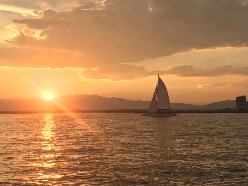 From Roses: Sunset Catamaran Cruise - The drink, music, and mood onboard
