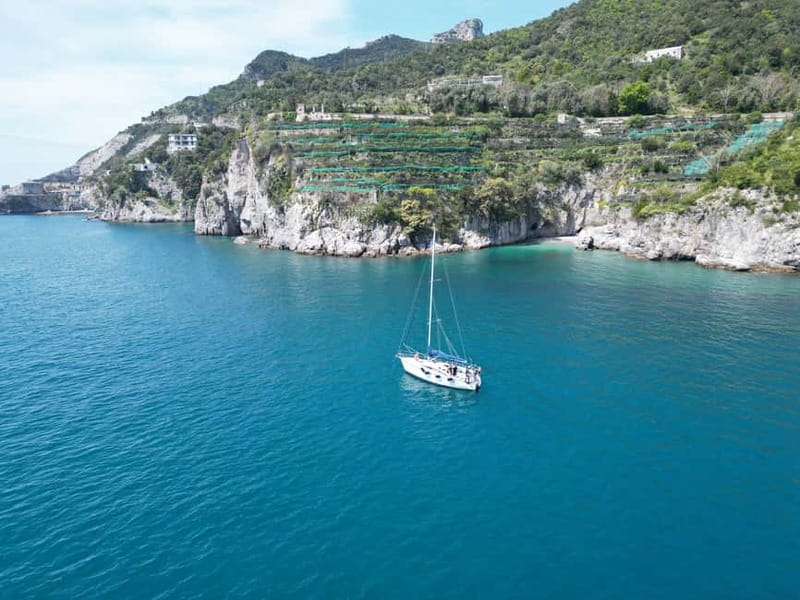 From Salerno: Amalfi Coast Full-Day Sailboat Trip with Lunch - Prosecco, fruit, and the approach to Amalfi
