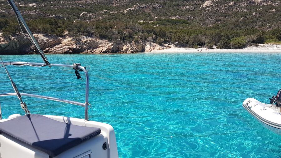 From Santa Teresa: Sailboat Tour to Corsica with Lunch - Lunch with local fish, wine, and Sardinian sweets