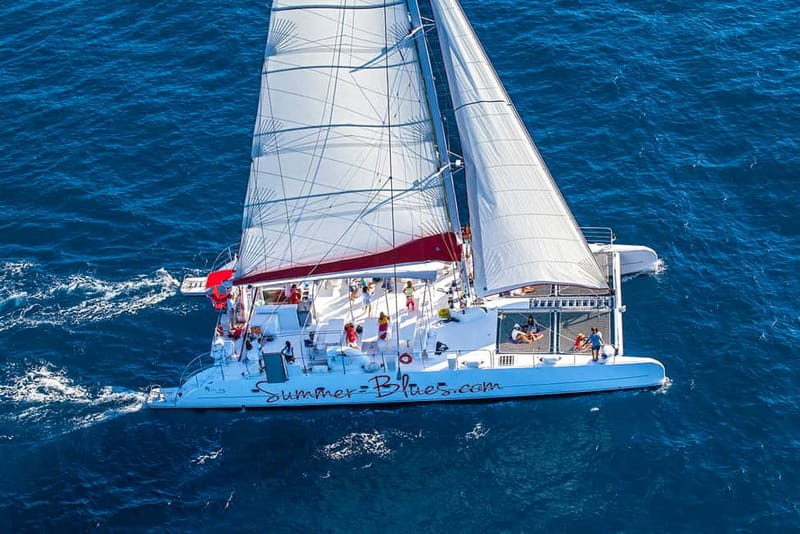 From Split: Catamaran Cruise to Golden Horn & Brač island. - A second bay, fruit, cake, and the sunset return