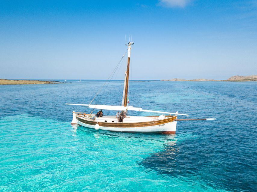 From Stintino: Asinara Vintage Sailing Boat Tour with Lunch - Cala Reale, quarantine buildings, and the white donkey