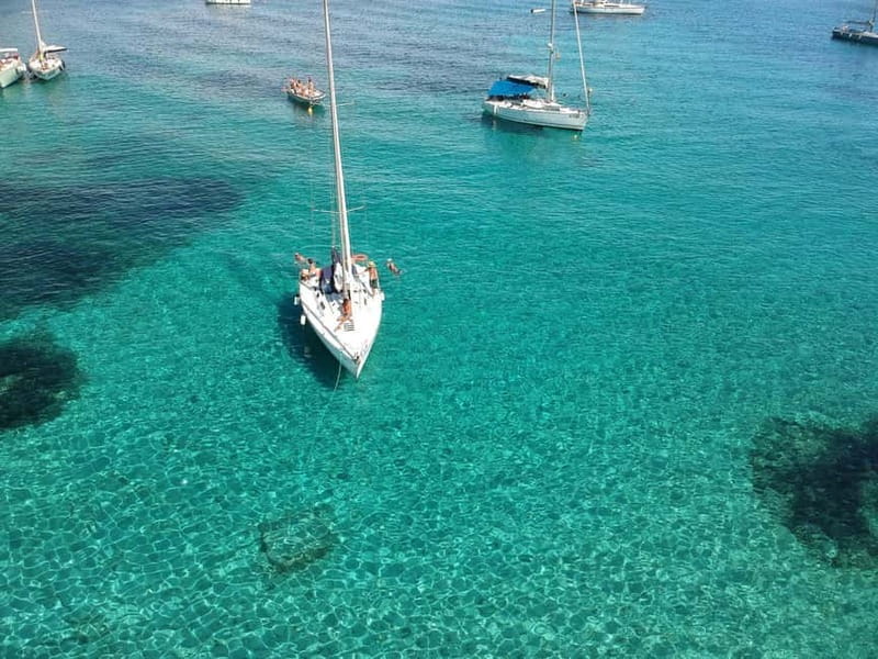 From Stintino: Half-Day Sailing Boat Tour to La Pelosa - Why the eight-person limit matters
