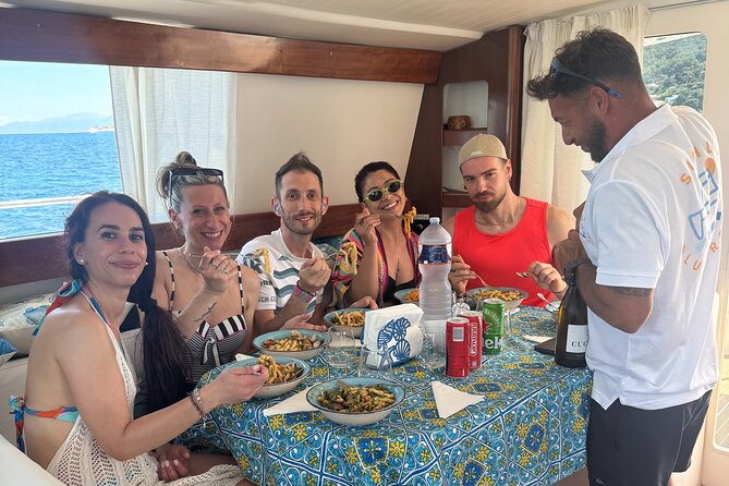 Full-day catamaran tour in Palermo: boat experience with lunch - Rocky water at Capo Gallo Nature Reserve