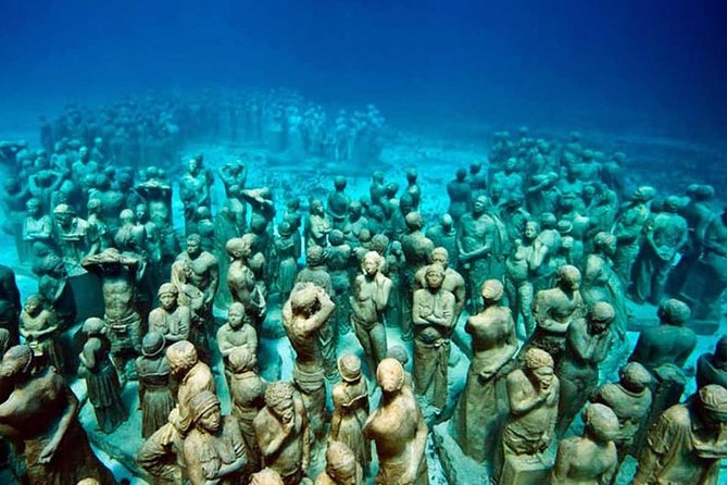 Full-Day Sailing Trip to Mujeres Island from Playa del Carmen - Snorkeling at Manchones reef and the underwater statues