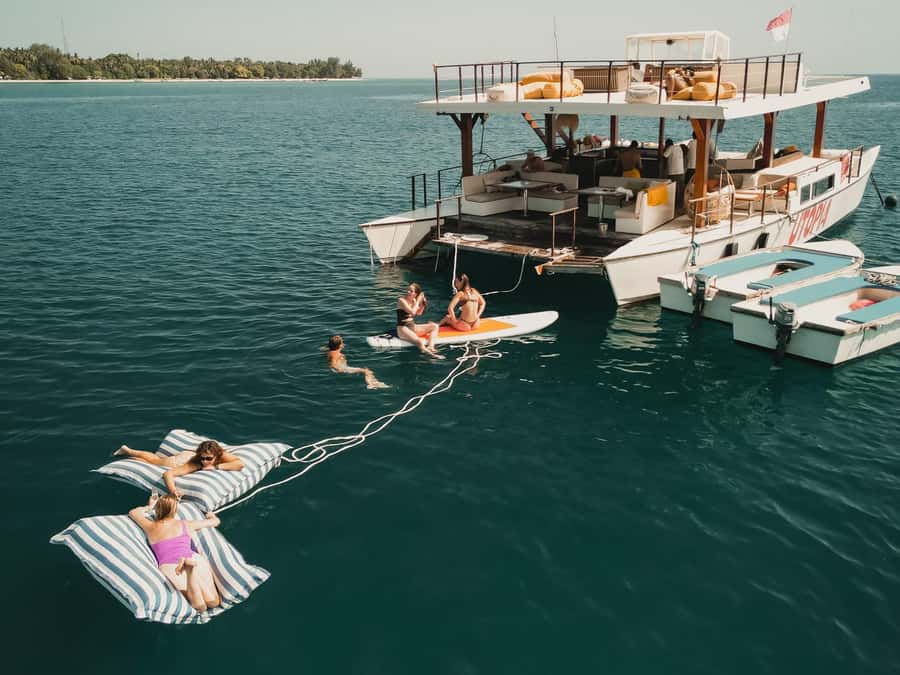 Gili Islands: 4-in-1 Catamaran Snorkeling Experience - A five-hour rhythm of swimming, eating, and relaxing