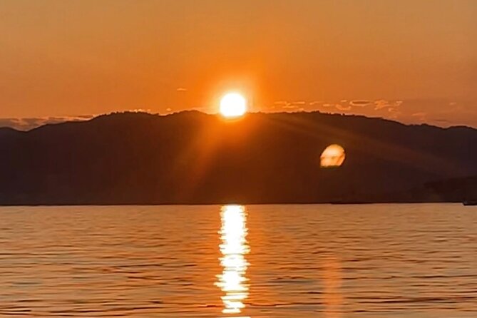Golf Juan: Sunset Sailing Cruise with aperitif at the Island - Chasing the last light across the bay