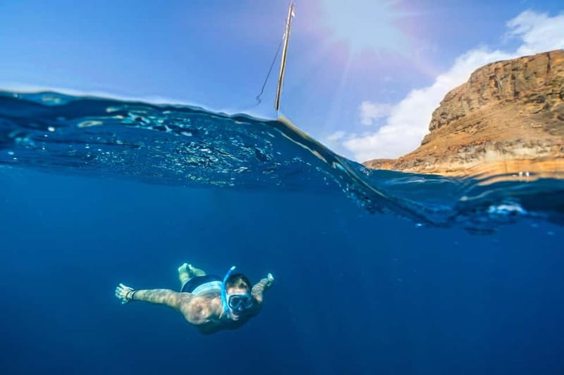 Gran Canaria: Catamaran Tour with Lunch on Pristine Beaches - Paella, salads, fruit, and a glass of cava