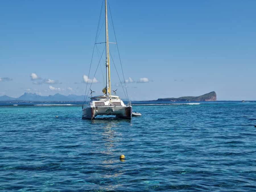 Grand Bay: Catamaran Cruise to Flat Island with BBQ Lunch - Sailing north from Grand Baie
