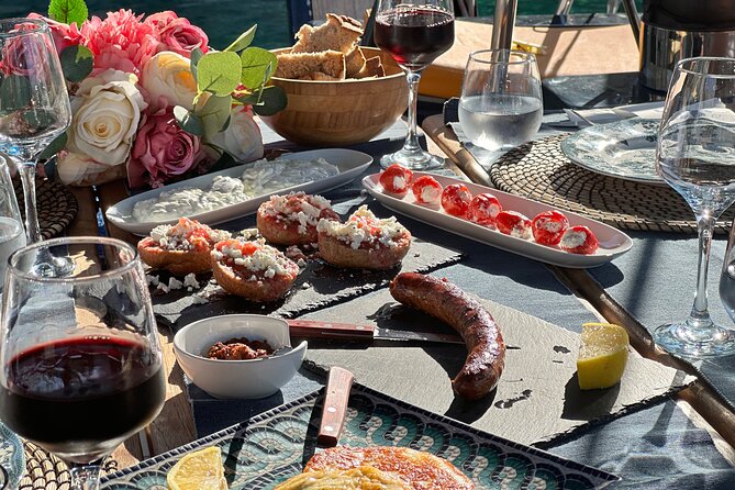 Greek Gastronomy & Wine Pairing Cruise with a Sommelier in Athens - The onboard Greek lunch