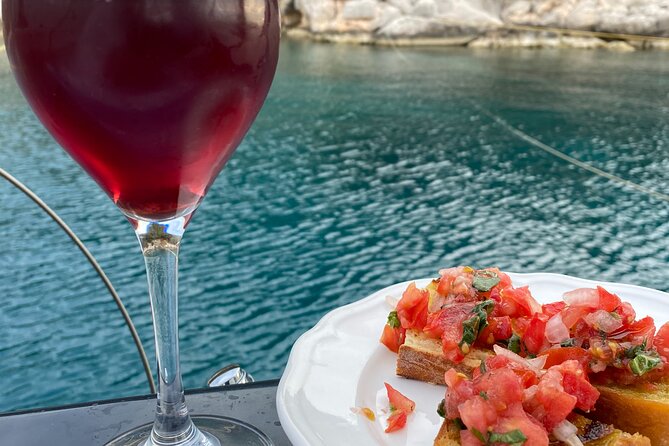 Greek Gastronomy & Wine Pairing Cruise with a Sommelier in Athens - Sunset, music, and the ride home