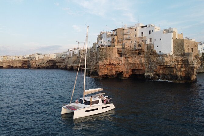 Guided Tour by Catamaran with Aperitif from Polignano a Mare - Lama Monachile, caves, and the San Paolo islet