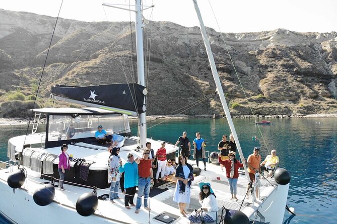 Half-Day Exclusive Catamaran Cruise in Santorini with Meal and Open Bar - Thirassia Island and the onboard lunch