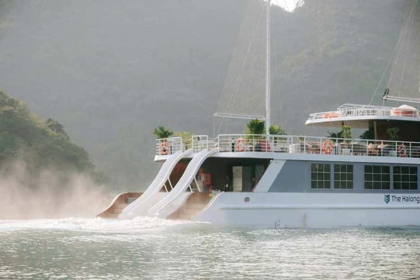 Hanoi/Ha Long: Ha Long Bay Luxury Day Cruise by Catamaran - Kayaking or bamboo boat through Luon Cave