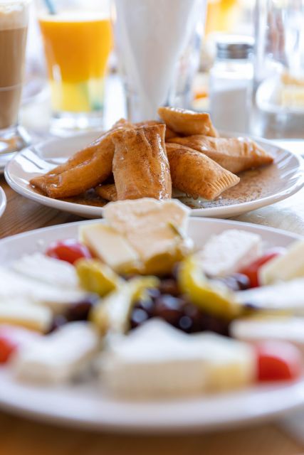 Heraklion: Sunrise Balloon Flight & Sunset Catamaran Cruise - Sushi, fruit, and sunset on the return sail