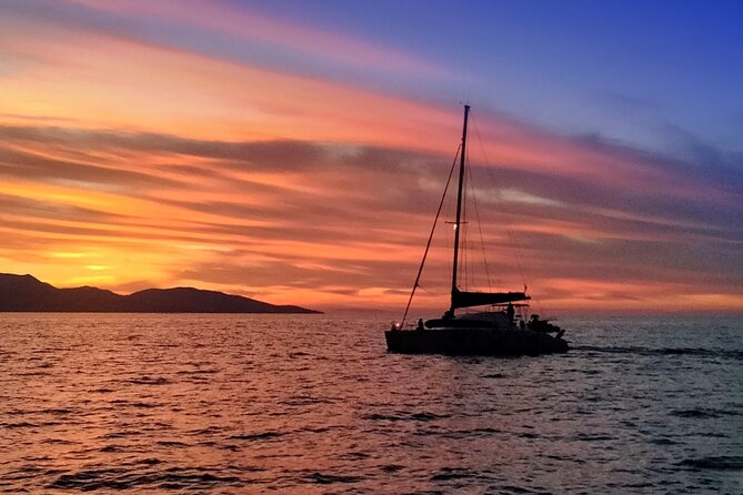 Hersonissos: Luxury Sunset Catamaran Cruise Sushi & Open Bar - Sailing from Hersonissos toward Saint George Bay