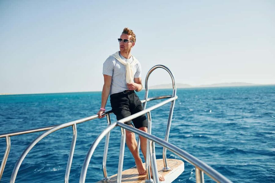 Hurghada: Orange Island Yacht Trip with Lunch & Water Sports - Guides, safety, and language support