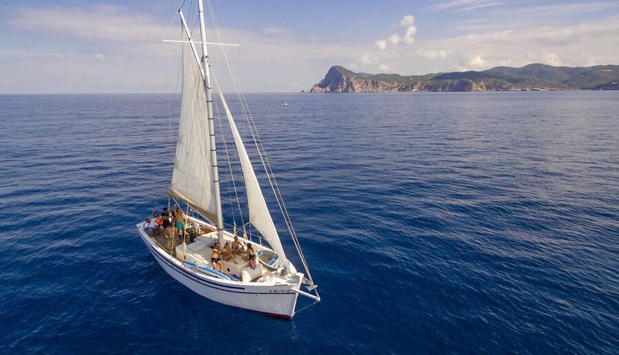 Ibiza: Private Sailboat with Premium Open Bar, Food & Music - Cala Bassa: food, water, and time to play