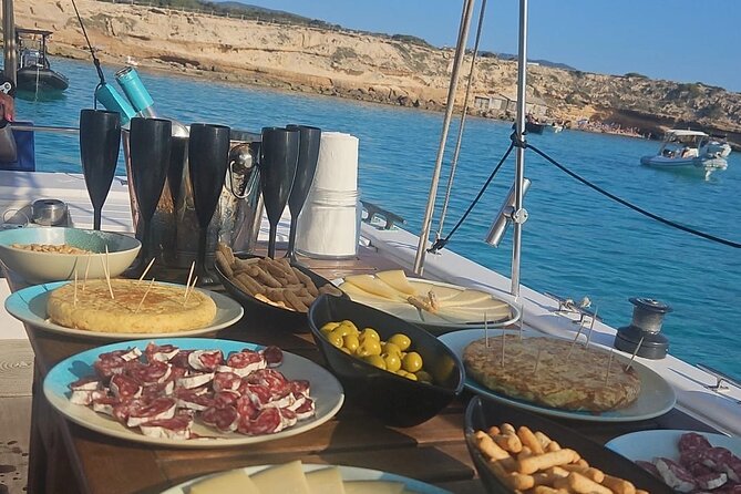 Ibiza: Private Sailboat with Tapas, Open Bar & Music - Port des Torrent and the coastal cave