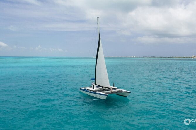 Isla Mujeres Basic Catamaran Tour with Snorkeling and Open Bar - Setting out from Playa Tortugas at 10 AM