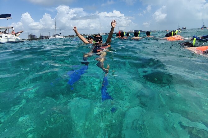 Isla Mujeres Catamaran Tour from Cancun with snorkel and Open Bar - One hour to see Isla Mujeres on your own