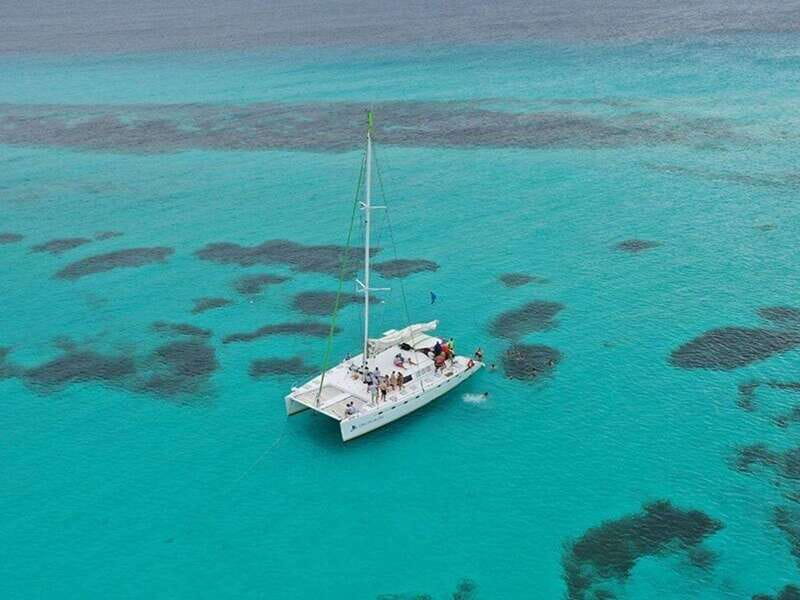 Isla Mujeres Catamaran Tour: Snorkel & Beach Adventure - Snorkeling at El Meco and the Underwater Statues