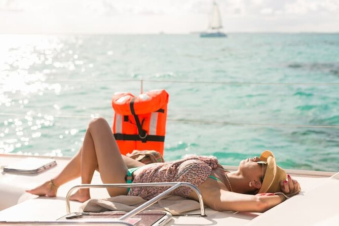 Isla Mujeres Catamaran Tour with Snorkel, Open bar and Transport - Sailing south toward El Meco reef