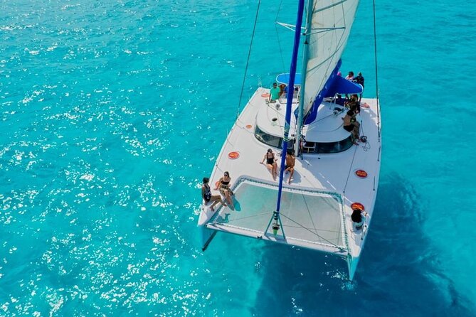 Isla Mujeres: Catamaran Tour with Snorkeling Food, Drinks, Beach - What to bring and how to plan the day