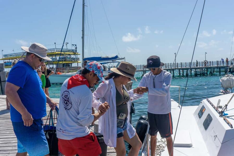 Isla Mujeres Catamaran Tour with Snorkeling & Open bar - An hour above MUSA at Arrecife El Meco