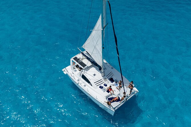 Isla Mujeres Day Tour with Catamaran, Snorkeling & Beach Club - Two hours or more to explore Isla Mujeres