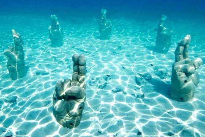 Isla Mujeres on luxury catamaran with snorkel, open bar and lunch - Full Service Versus the Lower-Cost Option