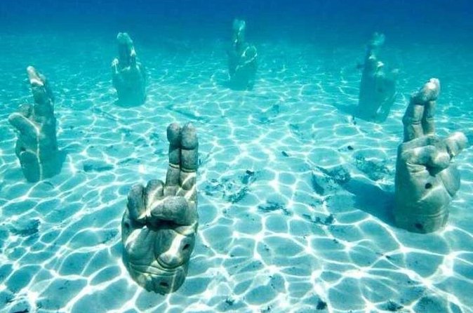 Isla Mujeres on luxury catamaran with snorkel, open bar and lunch - Booking Timing and Cancellation Rules