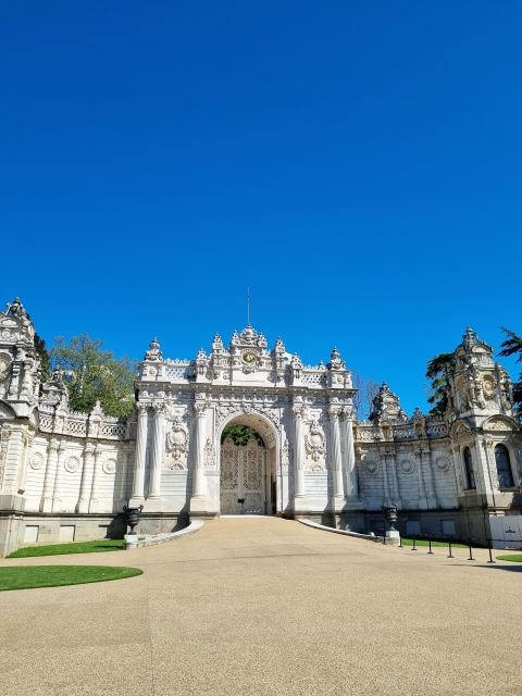 Istanbul: Dolmabahçe Palace Tour and Sunset Yacht Cruise - Starting beneath Dolmabahçe’s clock tower