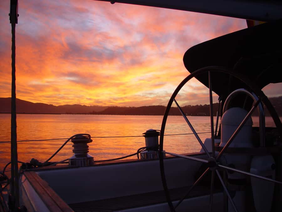 Knysna Sunset Sailing Cruise with Light Dinner and Wine - Sailing across the Knysna lagoon