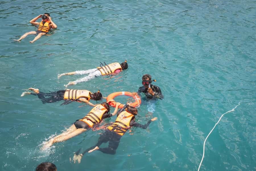 Koh Samui: Koh Tan and Koh Madsum Half-Day Tour by Catamaran - Koh Tan: snorkeling, swimming, and water sports