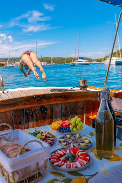 Korčula: Sail Away - tour with traditional craftmanship boat - Badija Island, monastery views, and a final swim