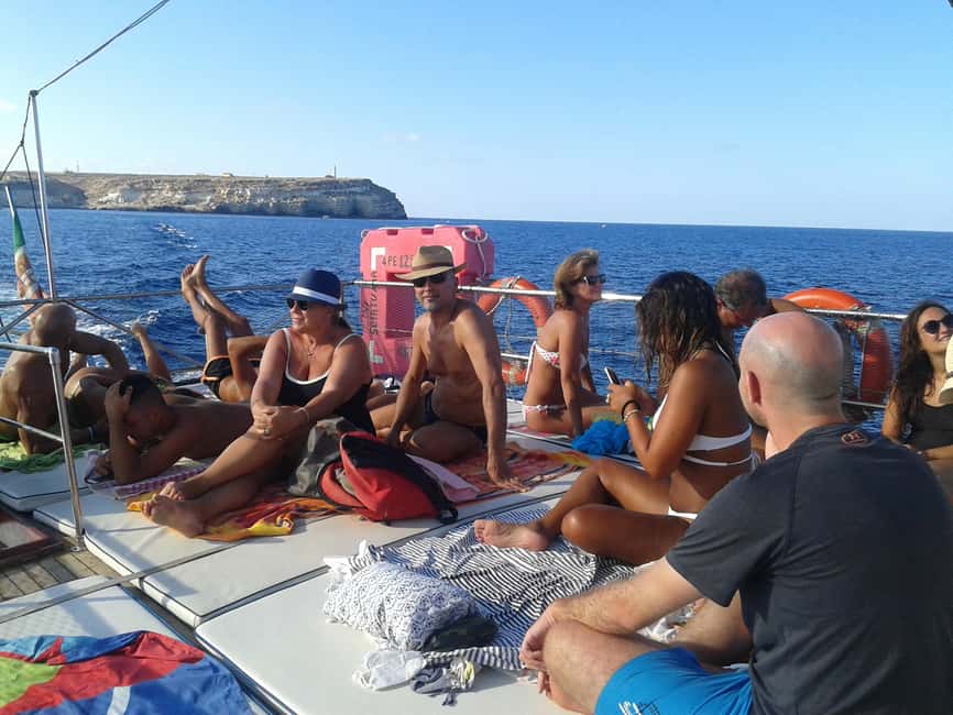 Lampedusa: Yacht excursion, swimming stops and typical lunch - Madonna Rock, Sacramento Stack, and the return along the east