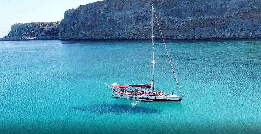 Lindos: Full-Day Private Sailing Cruise - Haraki Bay and the view toward Feraklon