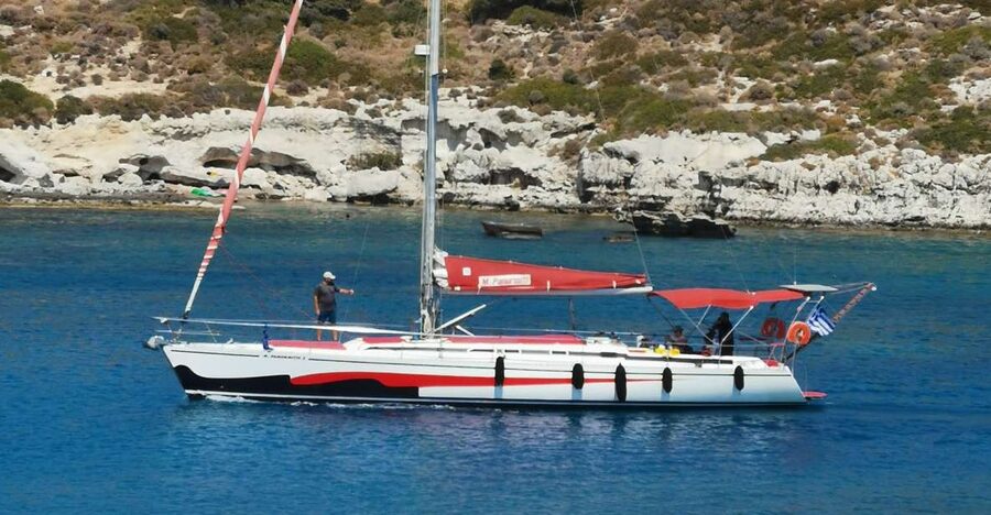 Lindos: Full-Day Private Sailing Cruise - Red Sand Beach: the quiet opening stop