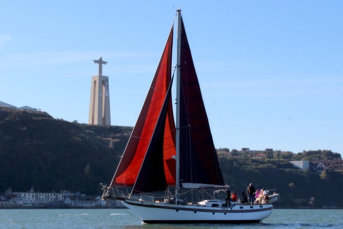 Lisbon: Daylight or Sunset on a Vintage Sailboat - Belém landmarks from a lower, wider viewpoint