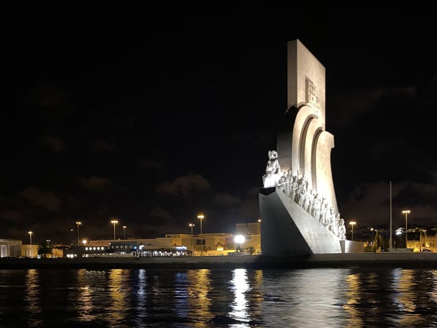 Lisbon: Luxury Sailboat Cruise at Night - Passing beneath the 25 de Abril Bridge