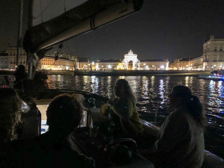 Lisbon: Luxury Sailboat Cruise at Night - Time Out Market and the approach to central Lisbon