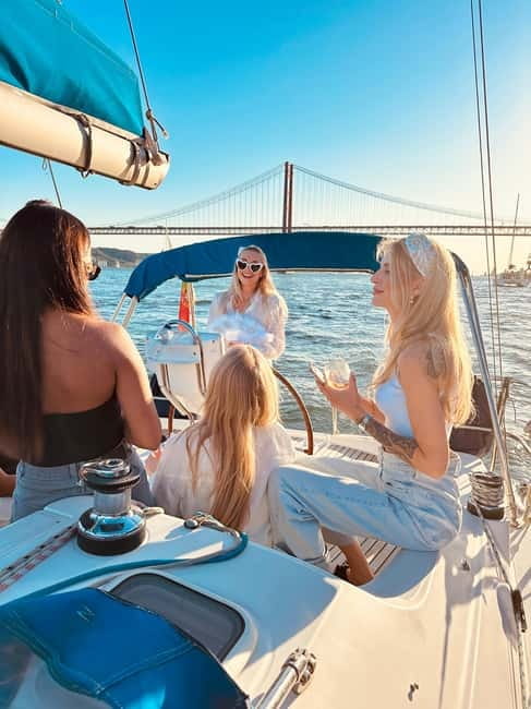Lisbon On a Sailboat - Cultural Facts and Sailing Experience - The bridge, Almada, and Christ the King